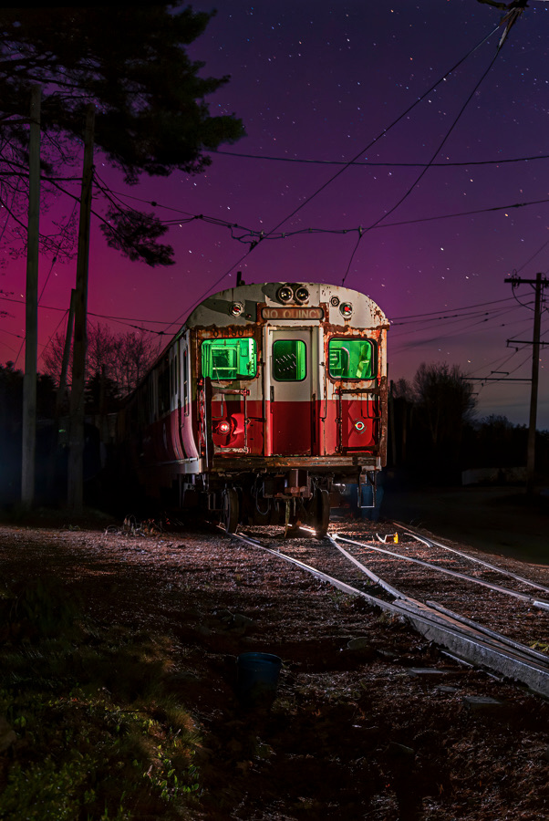 Photograph of subway car at night